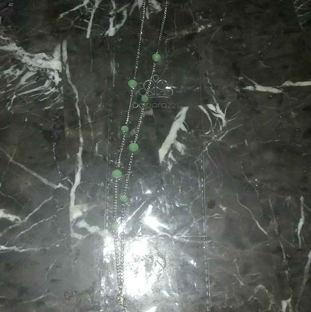 Cute silver necklace with green beads
